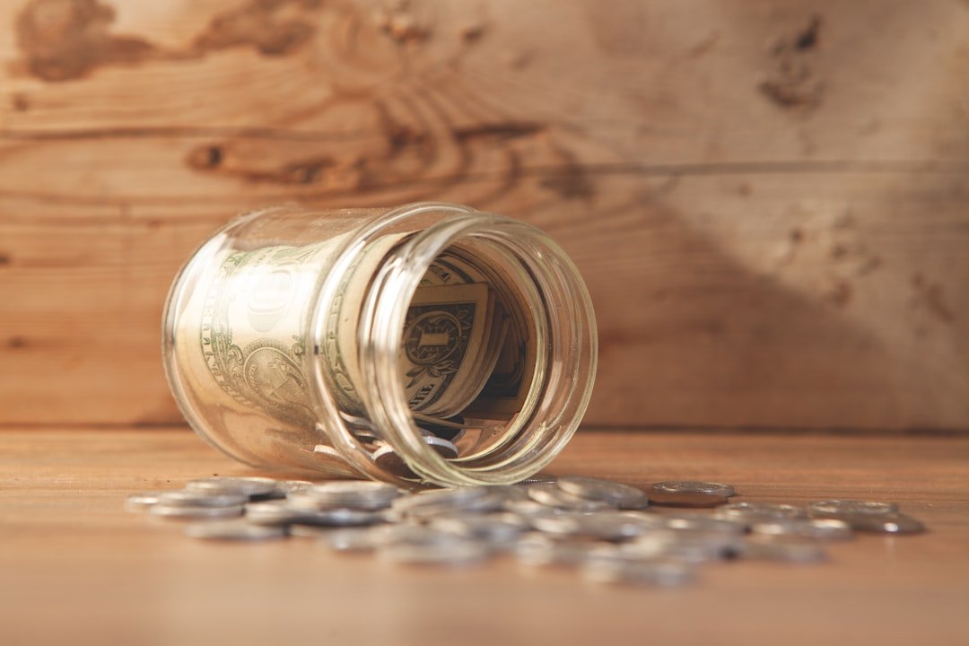 Mastering the First Impression: Your intriguing post title goes here money in glass jar with dollar bills. business concept